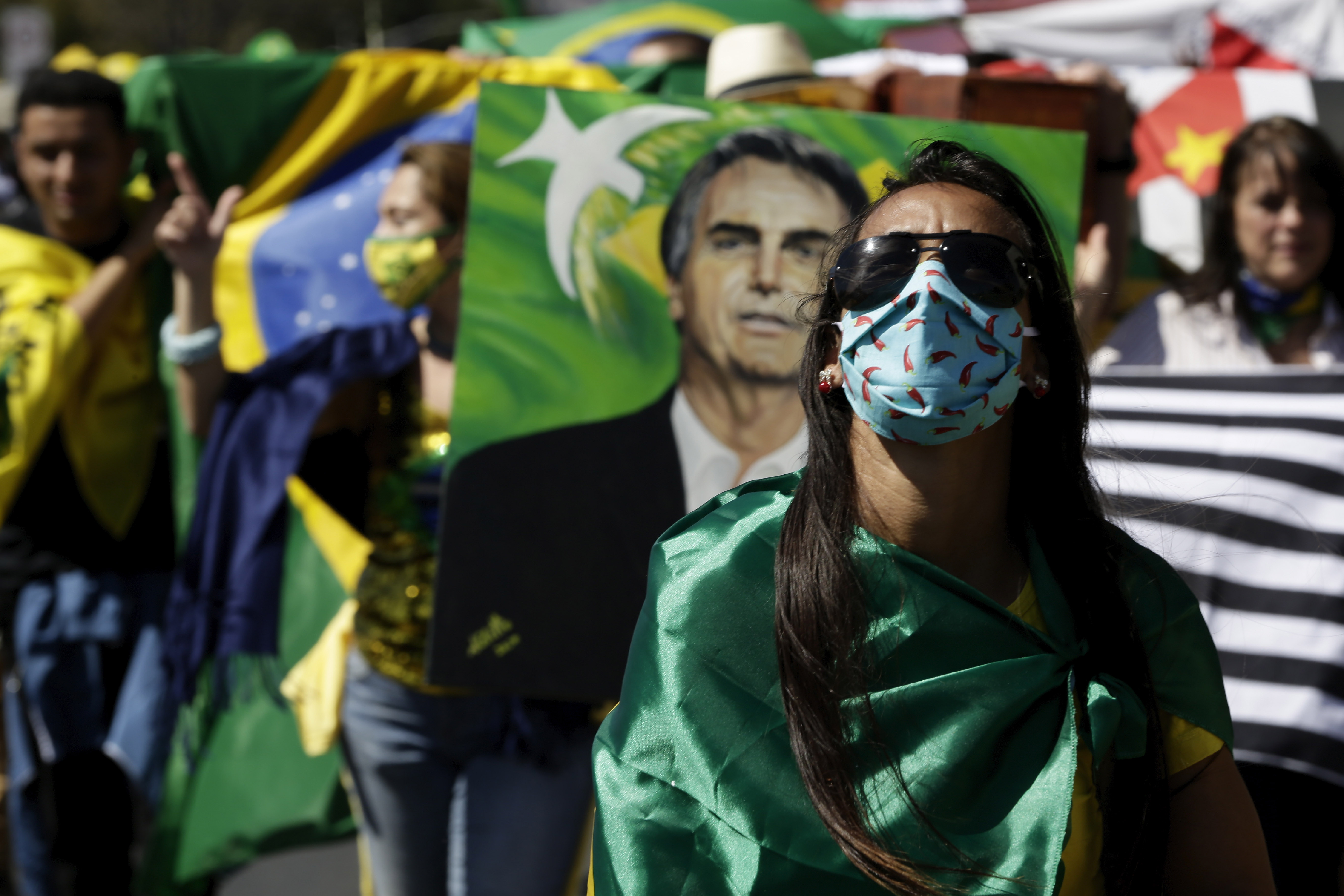 The Latest: SKorea's new virus cases bounce back after drop