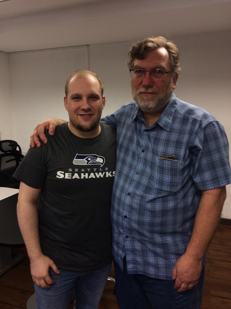 Josh Holt and Caleb McCarry, a former Senate staffer, pose for a photo inside El Helicoide in early 2018.