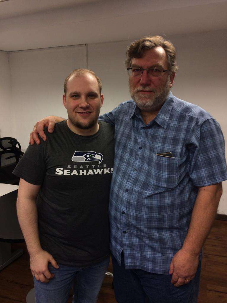 Josh Holt and Caleb McCarry, a former Senate staffer, pose for a photo inside El Helicoide in early 2018.