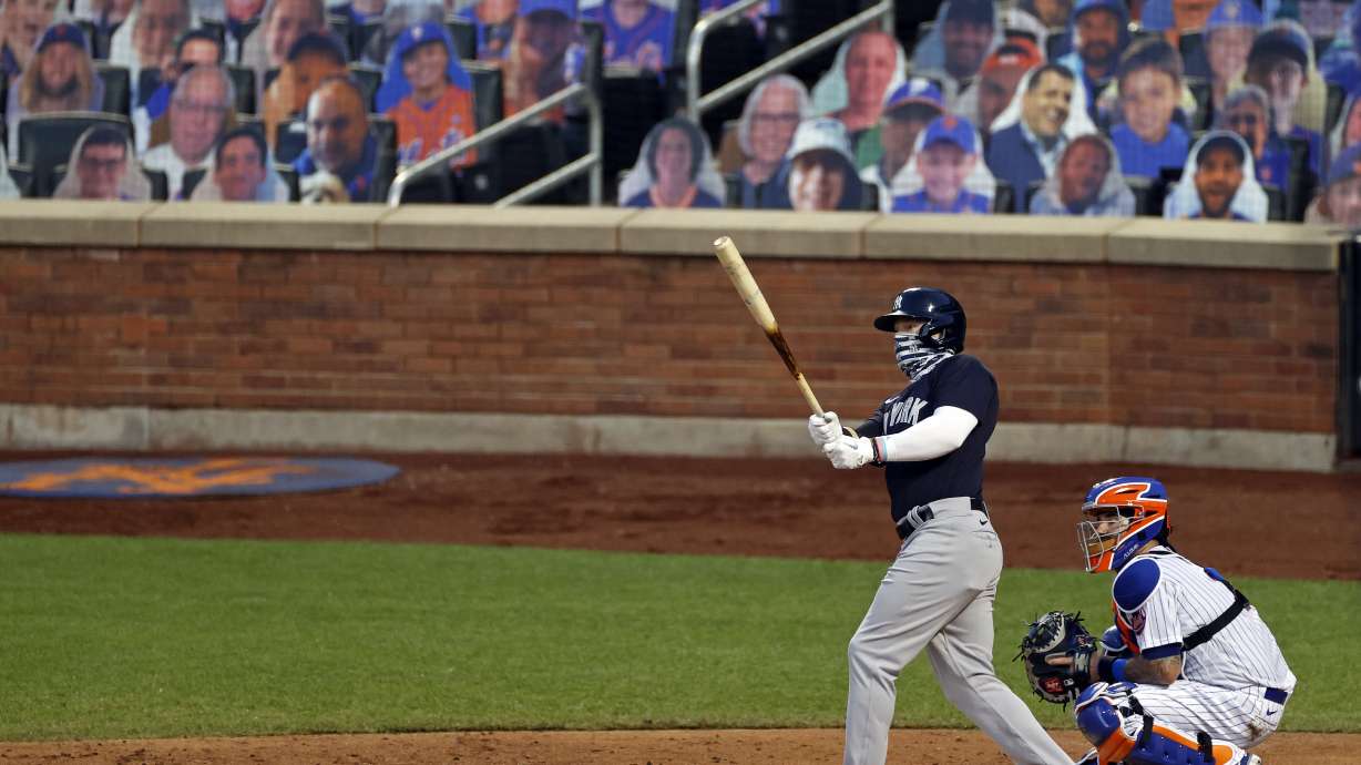 Opening day amid virus: Masks, empty parks, social justice