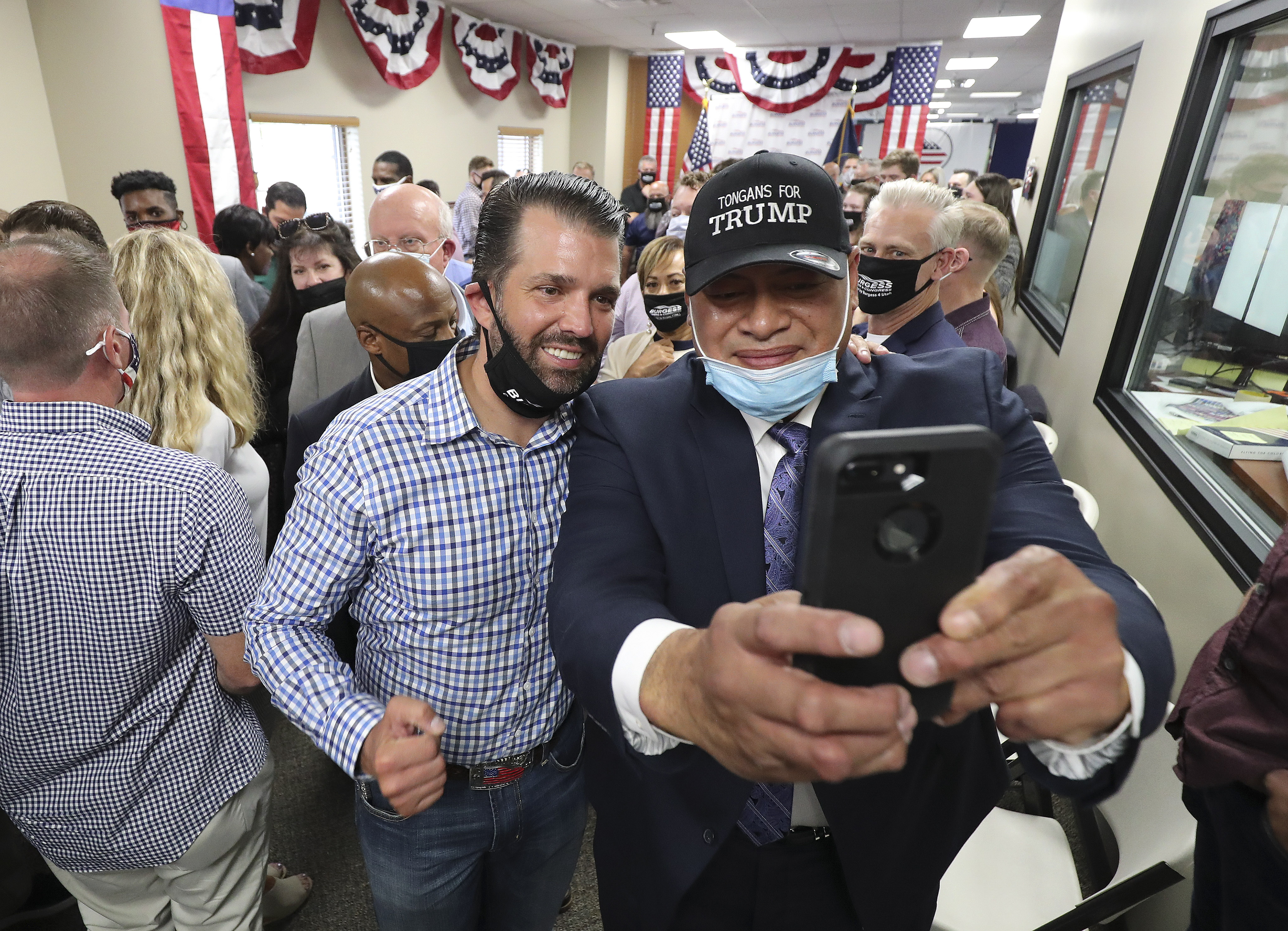 Moses Tauteoli, right,  takes a selfie with Donald Trump Jr. at Colonial Flag in Sandy on Thursday, July 23, 2020.