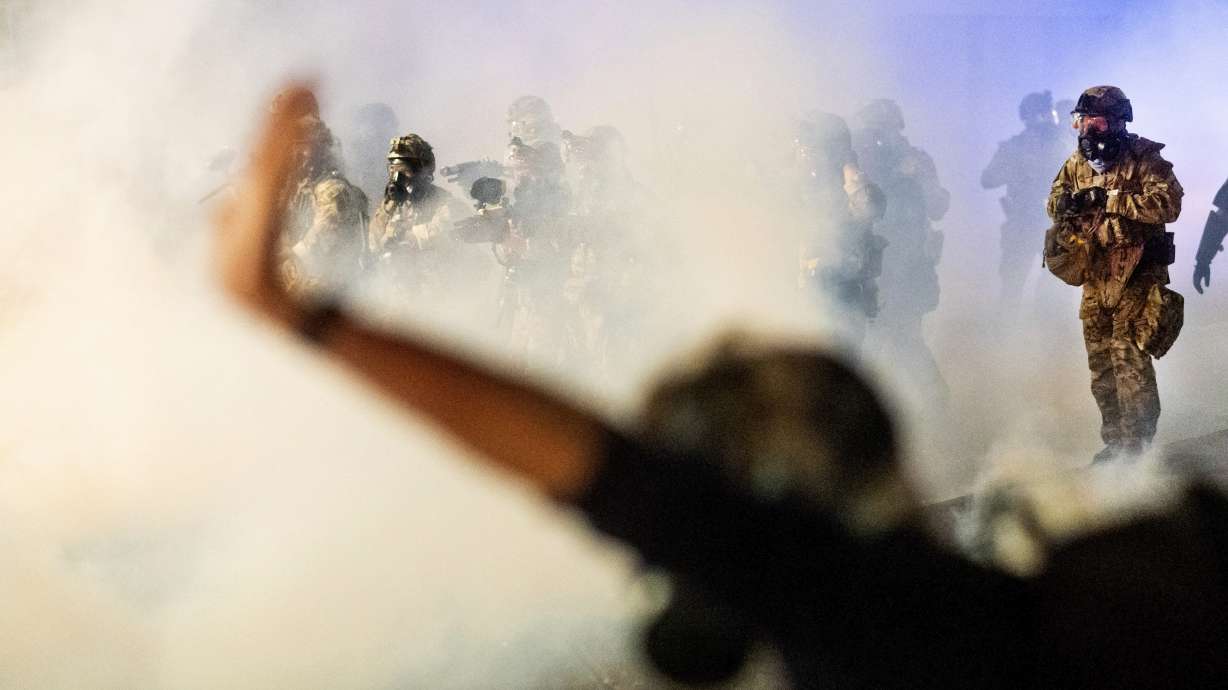 Federal agents use tear gas to clear rowdy Portland protest