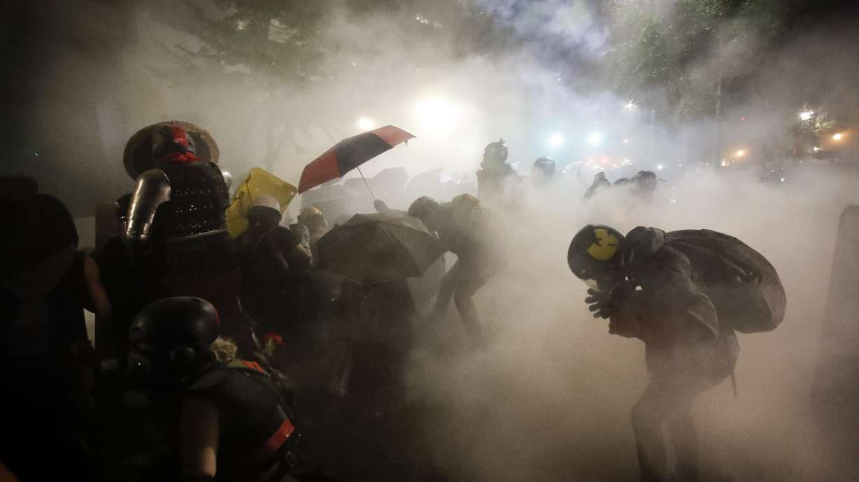 Police and protesters clash in violent weekend across the US