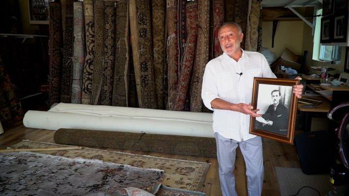 Ashot Ouzounian shows off a picture of his grandfather, a man he calls his "idol," Sunday, July 26, 2020.