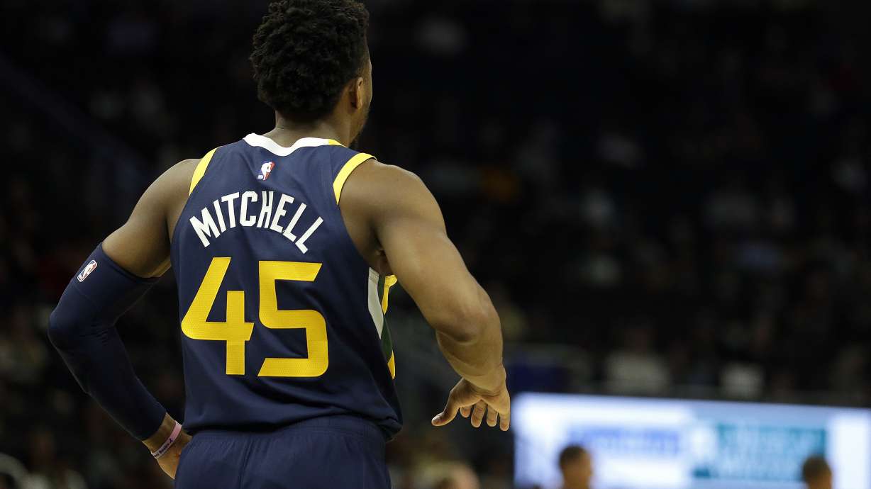 Utah Jazz's Donovan Mitchell during the first half of a preseason NBA basketball game against the Milwaukee Bucks Wednesday, Oct. 9, 2019, in Milwaukee.