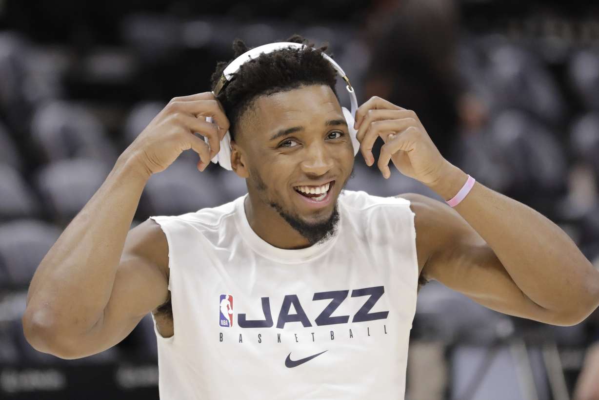Utah Jazz guard Donovan Mitchell (45) smiles during practice before the start of their NBA basketball game against the Minnesota Timberwolves Monday, Nov. 18, 2019, in Salt Lake City.