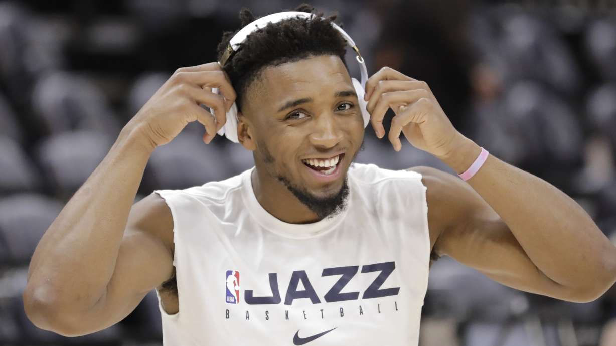 Utah Jazz guard Donovan Mitchell (45) smiles during practice before the start of their NBA basketball game against the Minnesota Timberwolves Monday, Nov. 18, 2019, in Salt Lake City.