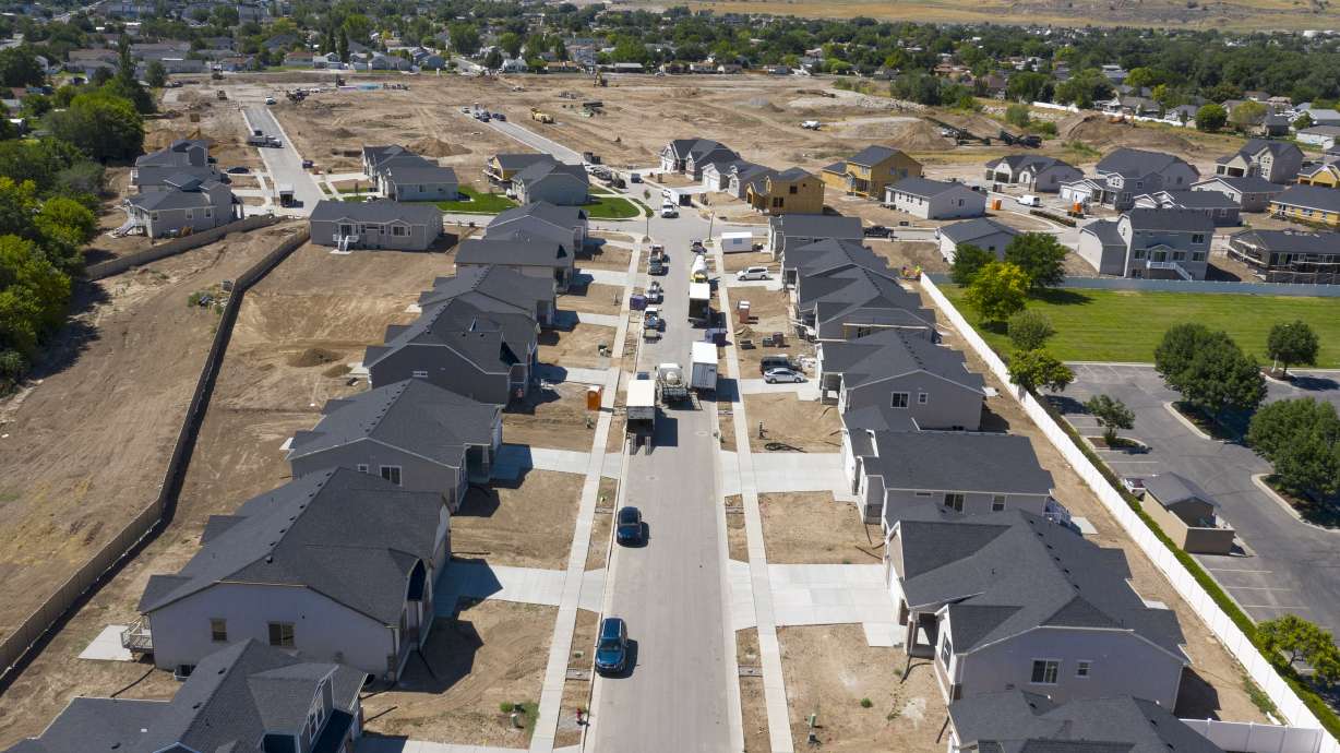 Homes near completion at C.W. Farms, an Ivory Homes development in Magna, on Wednesday, July 29, 2020. The Salt Lake City metro area is the third-most competitive housing market in the nation, according to a July ranking by Redfin, behind only Boston and San Diego. Robert Spendlove, Zions Bank senior economist, and Mike Gould, mortgage division manager for Zions Bancorporation, talked about the current state of and outlook for Utah’s housing market during a press conference at the new subdivision.