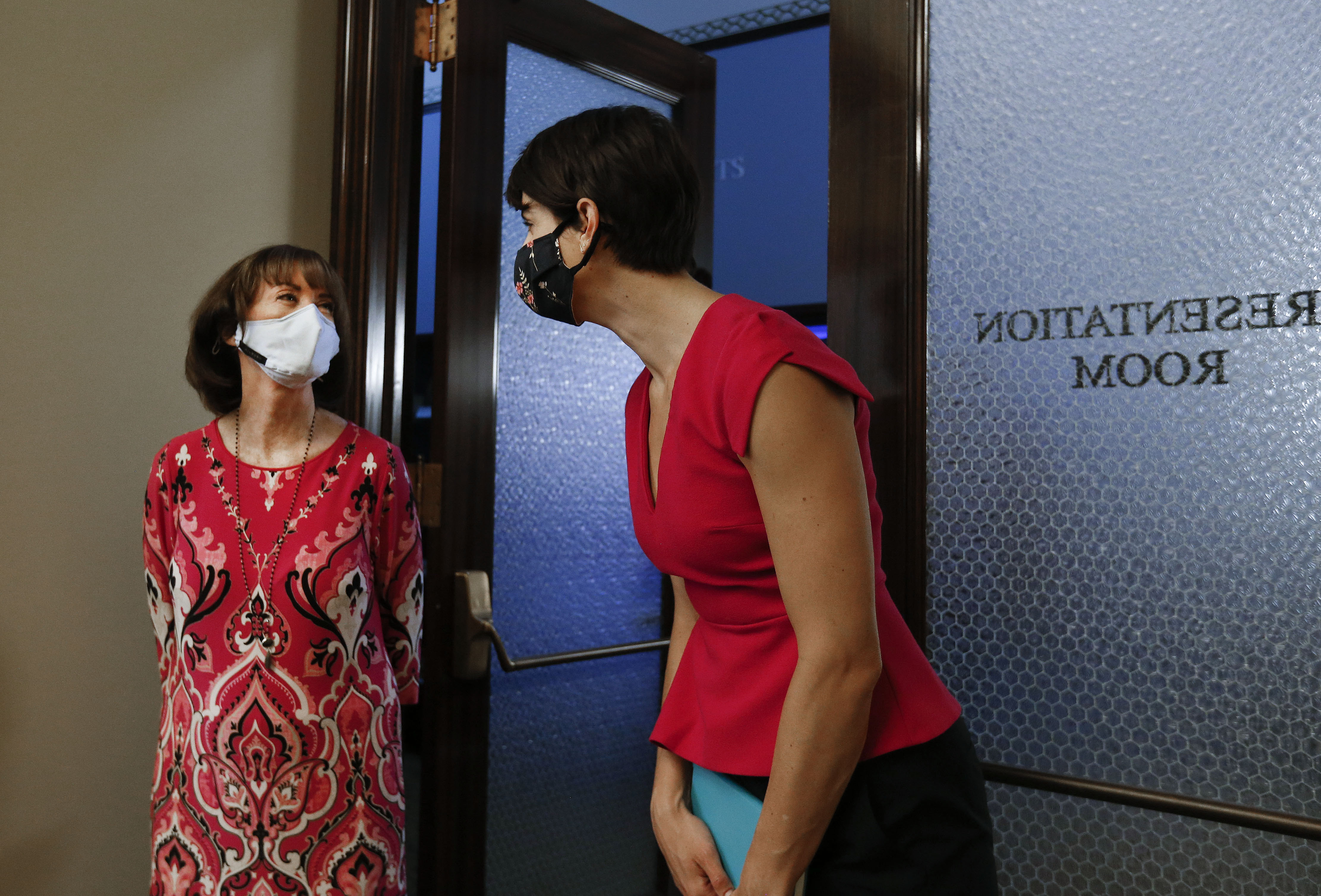Sydnee Dickson, state superintendent of public instruction, and Dr. Angela Dunn, state epidemiologist, talk during a COVID-19 briefing at the Capitol in Salt Lake City on Thursday, July 30, 2020.