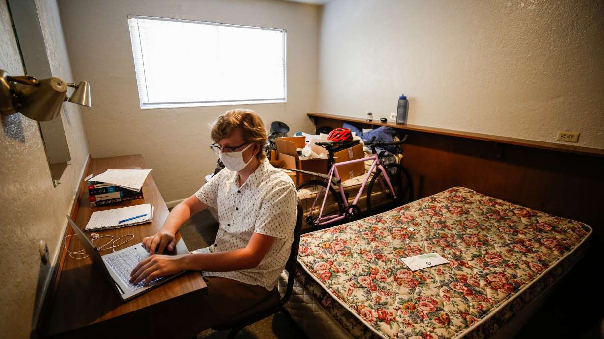 Jordan Hamann studies in an empty bedroom at his apartment in Provo on Monday, July 20, 2020.
