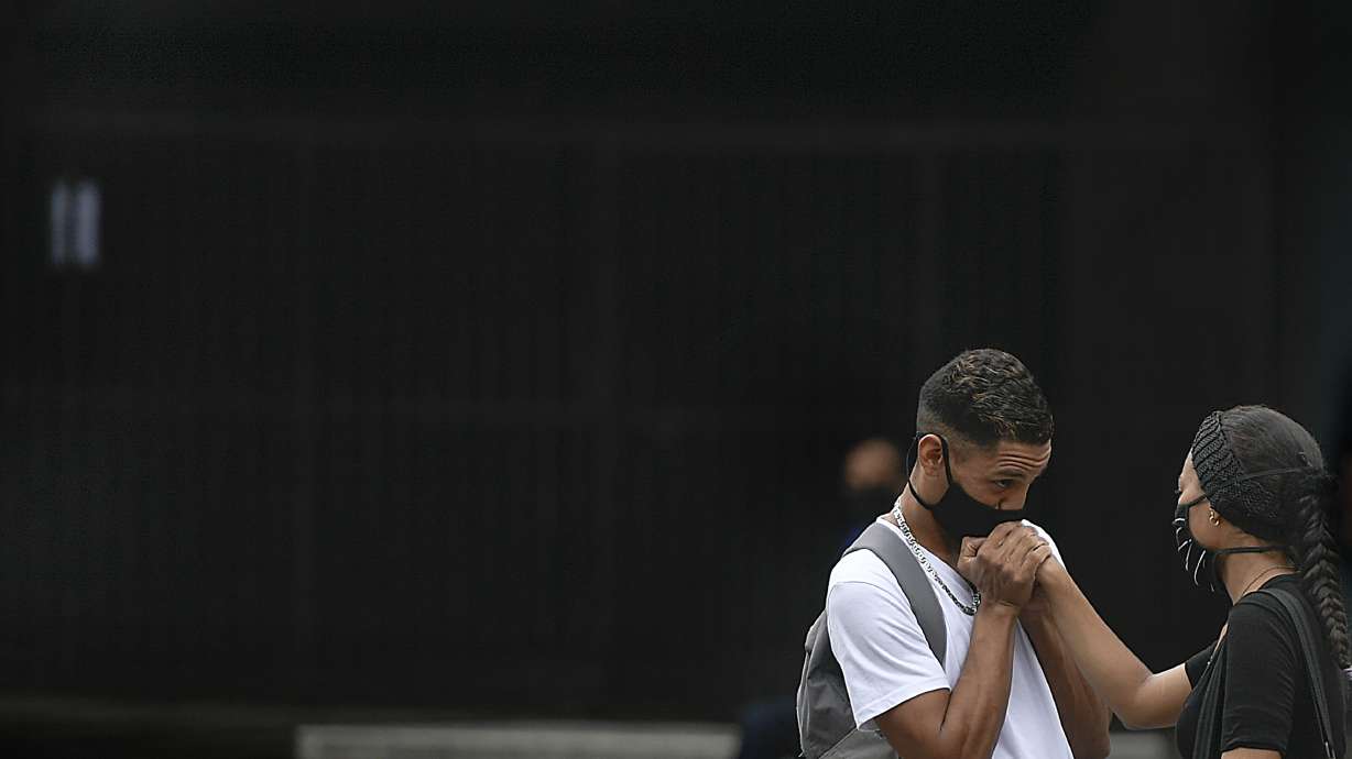 Virus surges in India, Philippines; Australia imposes curfew