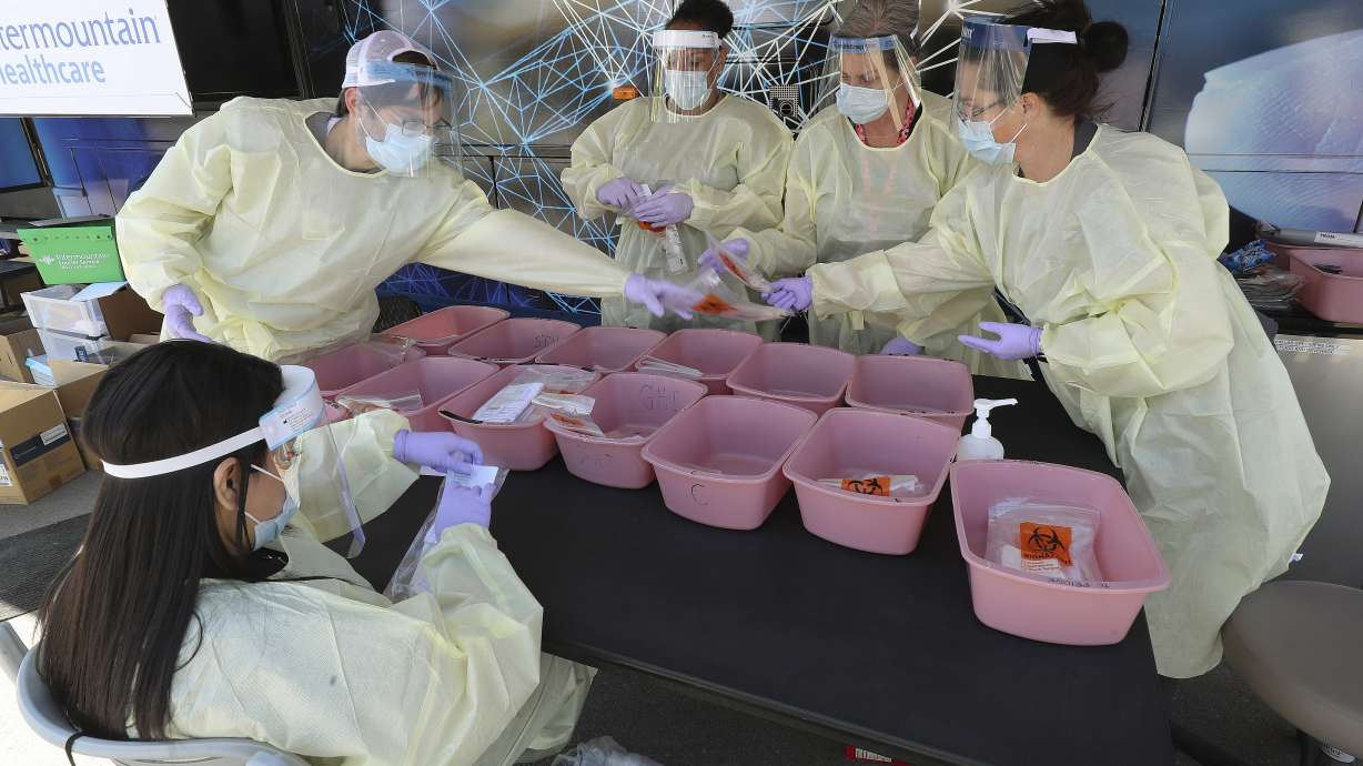 COVID-19 samples are sorted for the lab at Utah Valley Hospital in Provo on Friday, May 8, 2020. In an effort to help address COVID-19 hot spots that have been identified in Utah County, the Intermountain Healthcare Coronavirus Mobile Testing Unit provided testing to area residents.