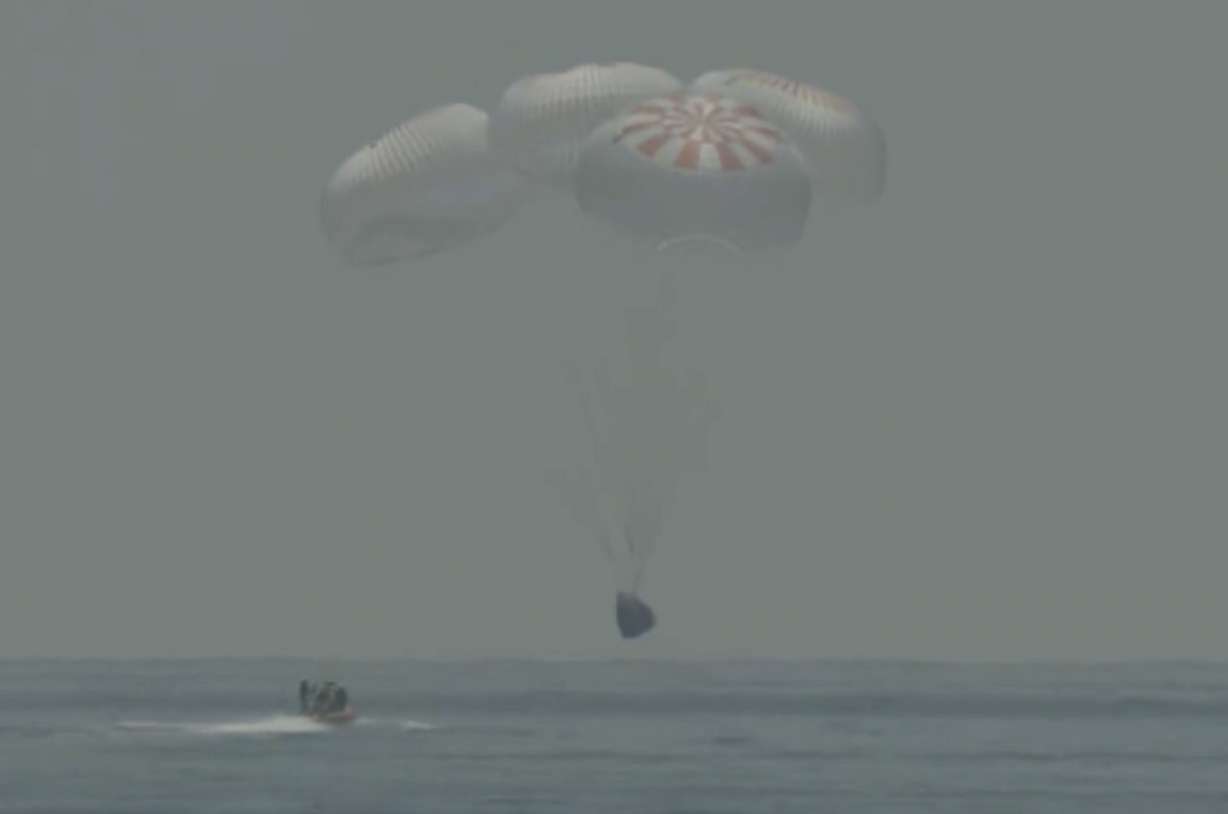 In this frame grab from NASA TV, the SpaceX capsule splashes down Sunday, Aug. 2, 2020 in the Gulf of Mexico. Astronauts Doug Hurley and Bob Behnken spent a little over two months on the International Space Station. It will mark the first splashdown in 45 years for NASA astronauts and the first time a private company has ferried people from orbit.