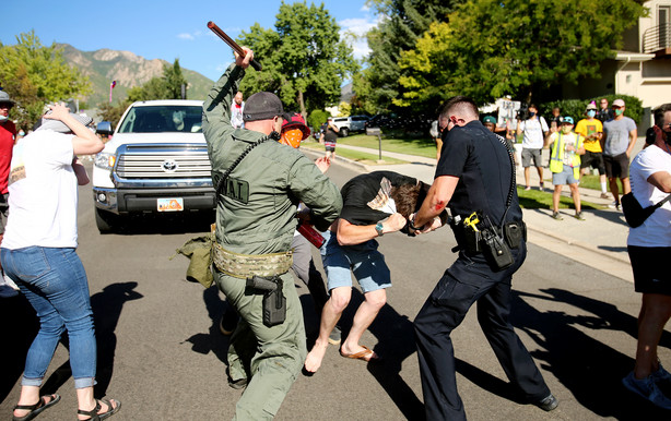 Gabriel Pecoraro fights with police after police and marchers collided in the streets of Cottonwood Heights on Sunday, Aug. 2, 2020. The group was marching on 6710 South when police blocked them at Cristobal Street and a confrontation ensued. Police said eight or nine protesters were arrested.