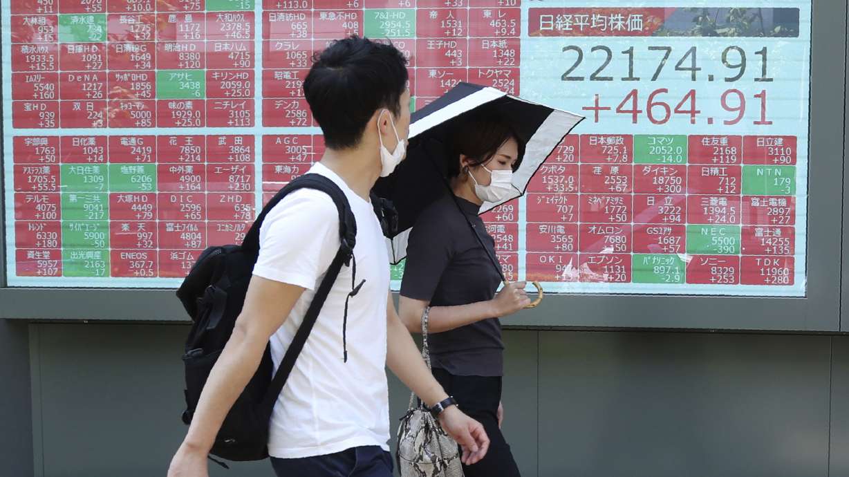 Asian shares track worldwide rally as S&P 500 nears record