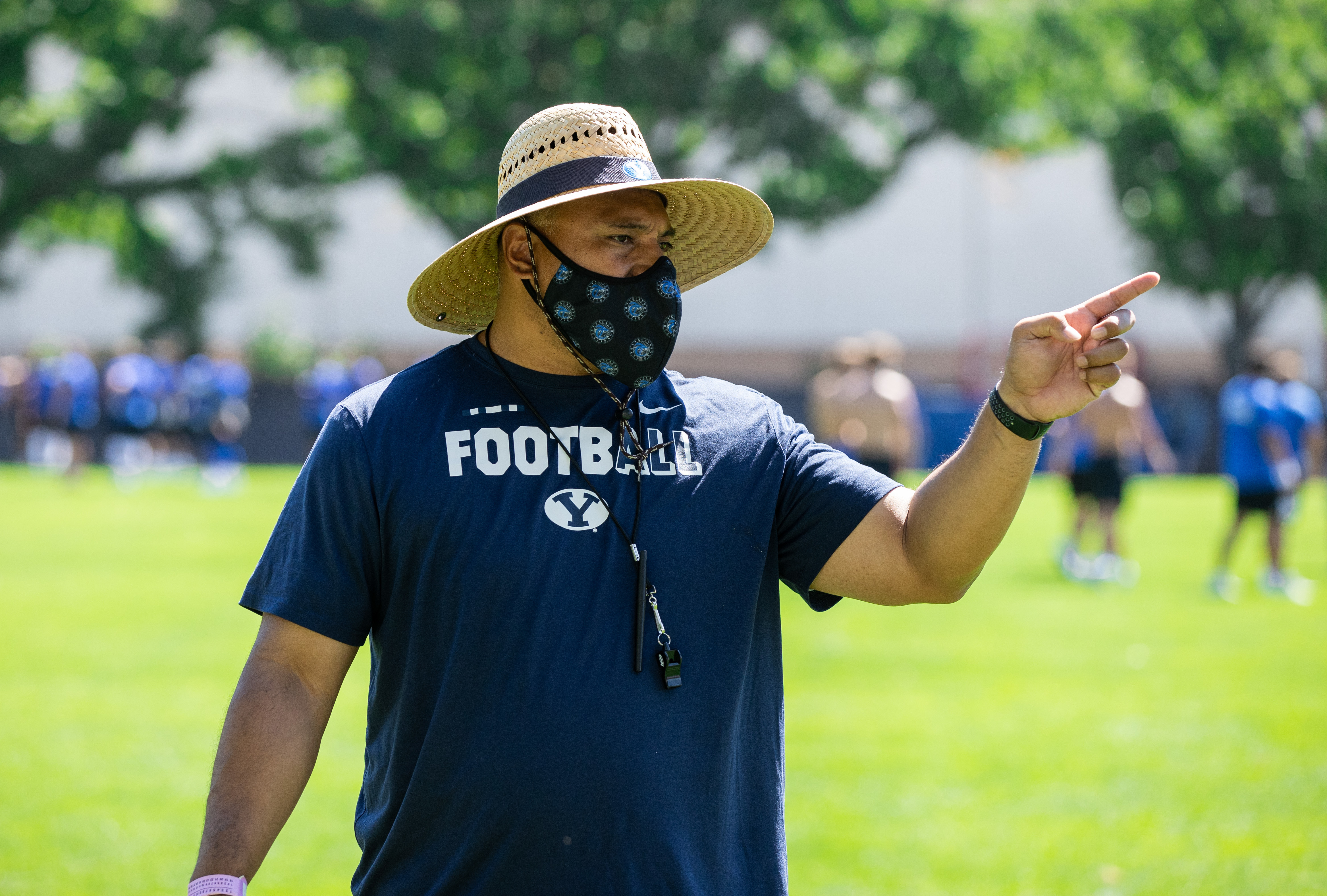 BYU football coach Kalani Sitake masks up during practice, July 27, 2020 in Provo, Utah.