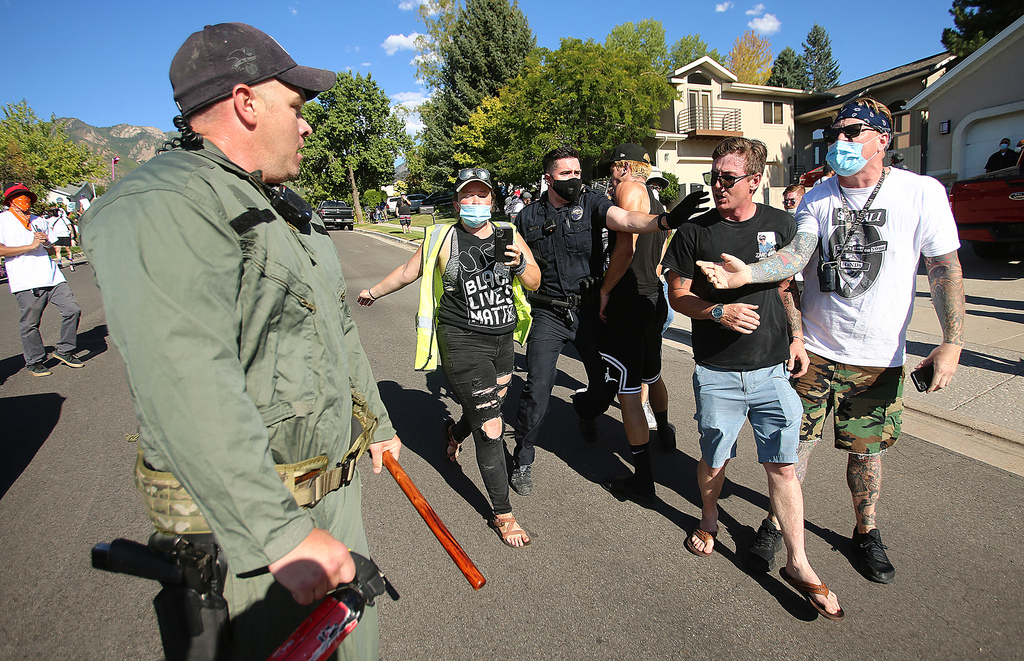 Police position themselves to take Gabriel Pecoraro into custody after officers and marchers collided in the streets of Cottonwood Heights on Aug. 2, 2020. Pecoraro pleaded guilty to interfering with an officer, a class B misdemeanor, on Sept. 3, as part of a plea in abeyance.