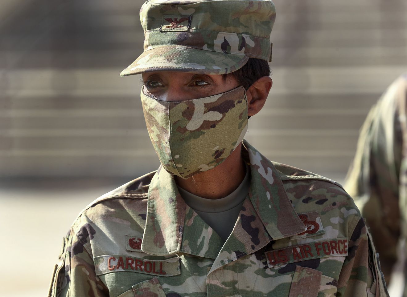 Col. Jenise M. Carroll, the new 75th Air Base Wing commander at Hill Air Force Base, wears her mask as she greats members of the media at the base near Clearfield on Monday, Aug. 3, 2020.