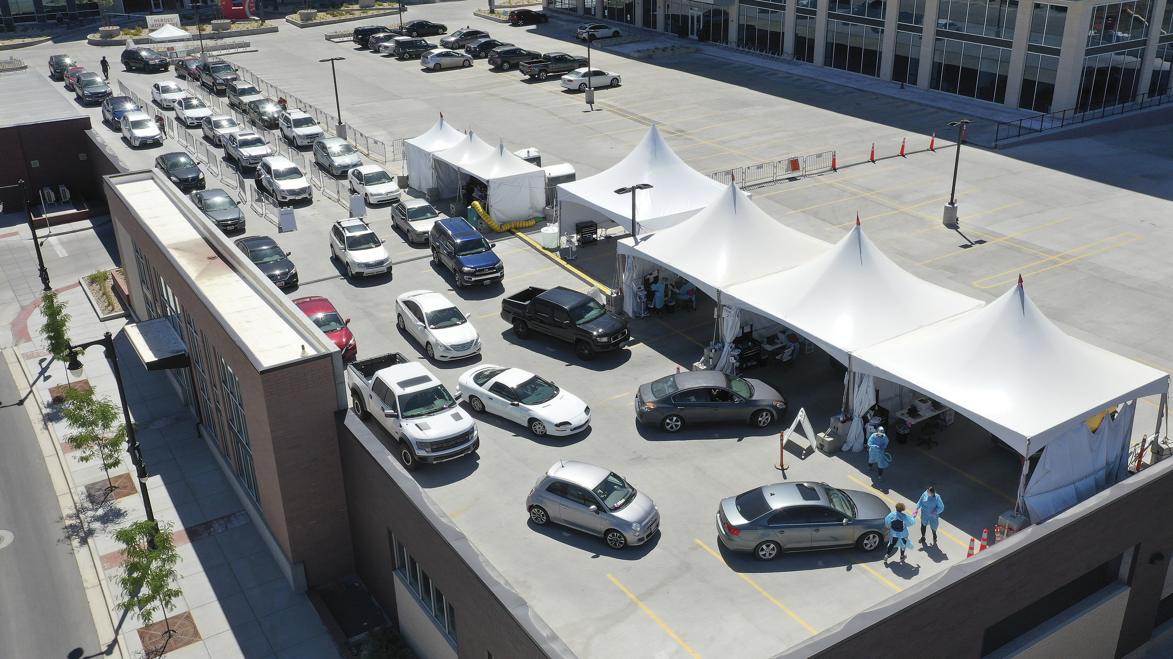 Numerous motorists line up for COVID-19 testing near University of Utah Health's Sugar House Health Center in Salt Lake City on Saturday, July 11, 2020.