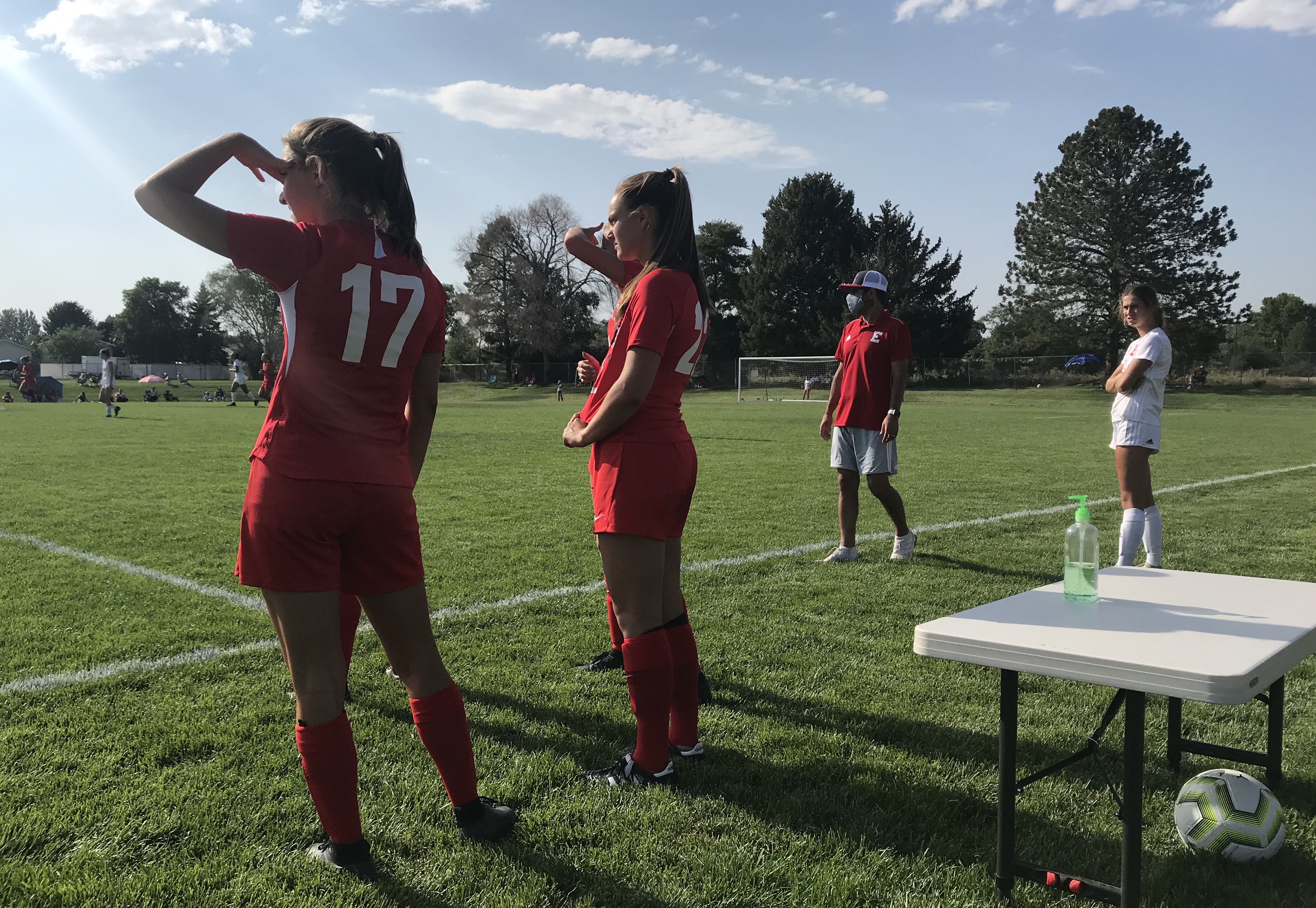 American Fork junior AJ Stromberg applies hand sanitizer before re-entering the game against East, Tuesday, Aug. 4, 2020. The Cavemen won, 6-1
