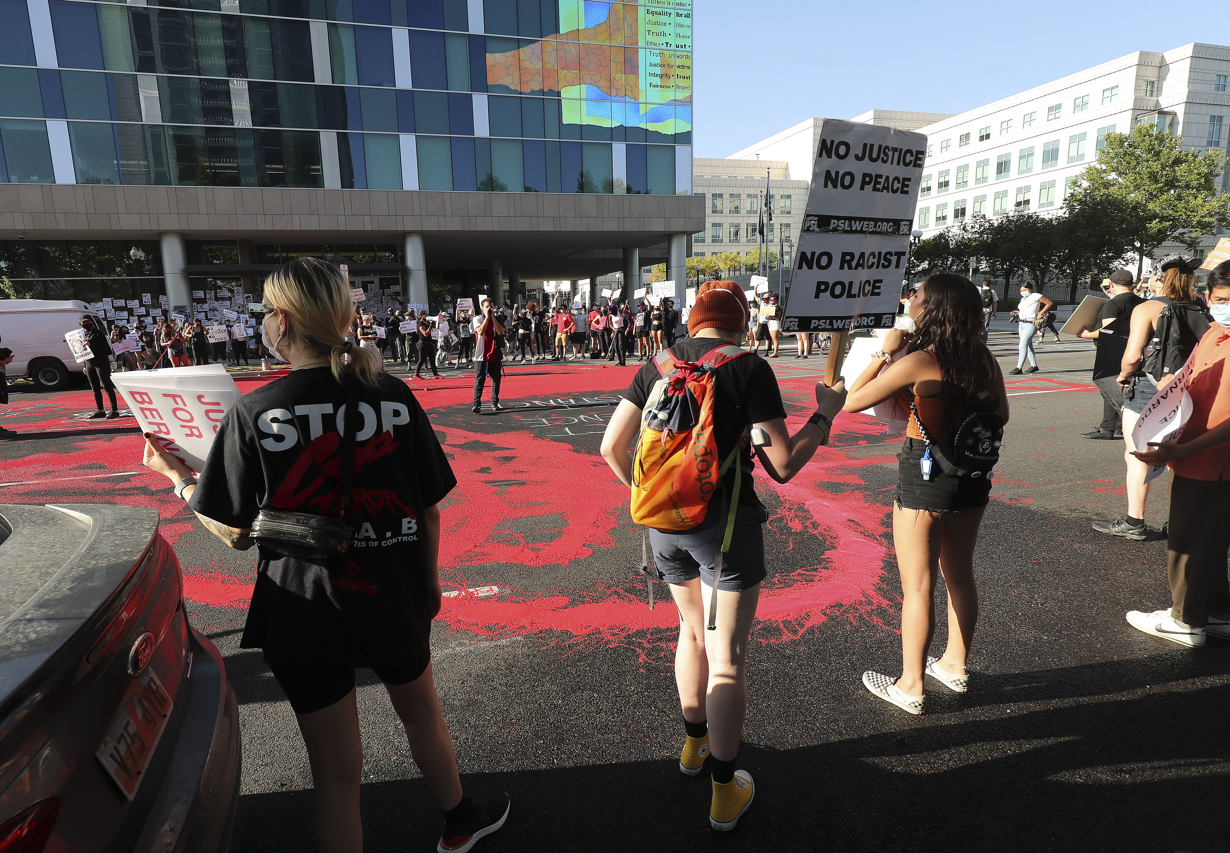 Protesters decrying the police shooting of Bernardo Palacios-Carbajal gather in the street in front of the district attorney's office in Salt Lake City on July 9, 2020. A federal judge this week dismissed a civil lawsuit Palacios' family filed against the officers and the city.