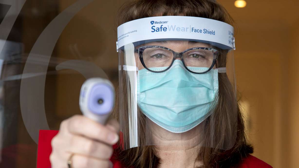 The Latest: UN says cybercrime hindering pandemic response