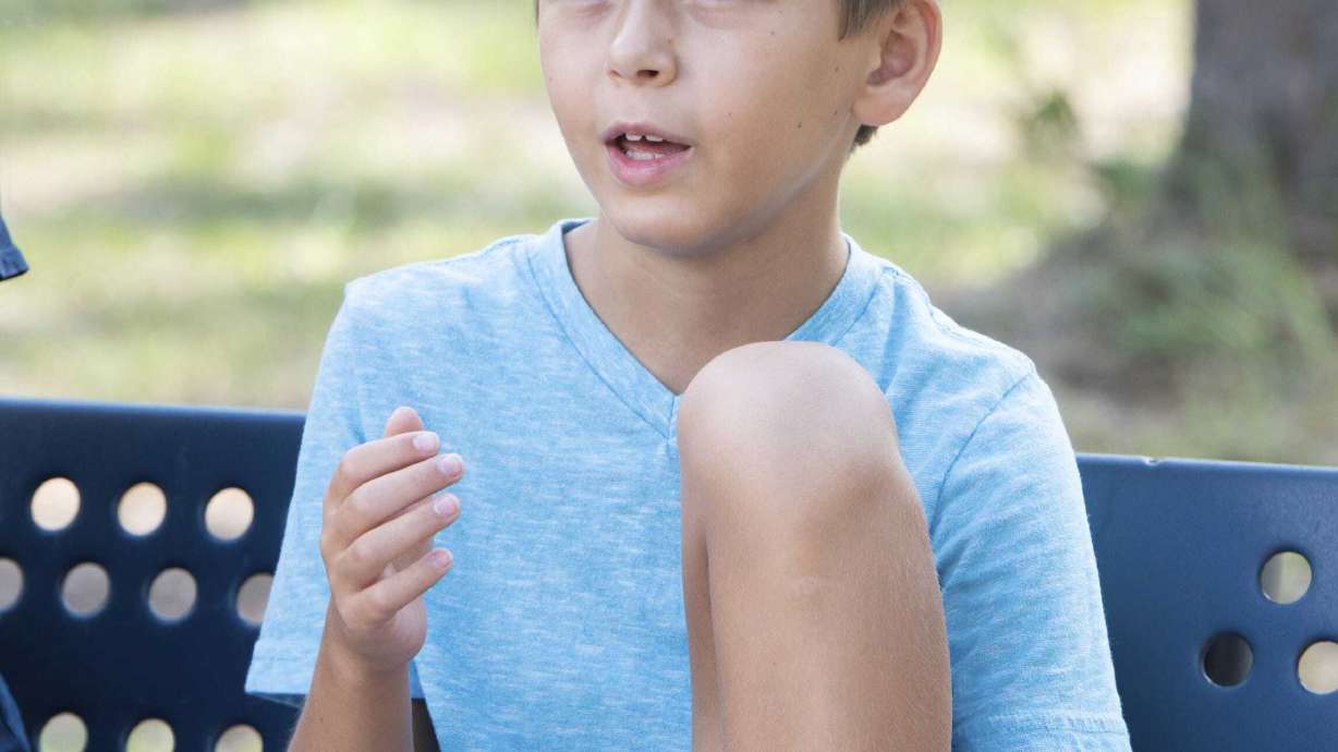 Man fractures neck in diving accident; young son saves him