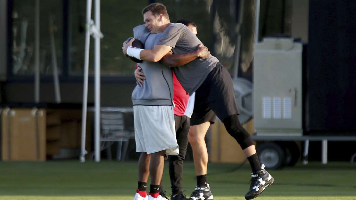 Brady learning new playbook, excited to get started in Tampa