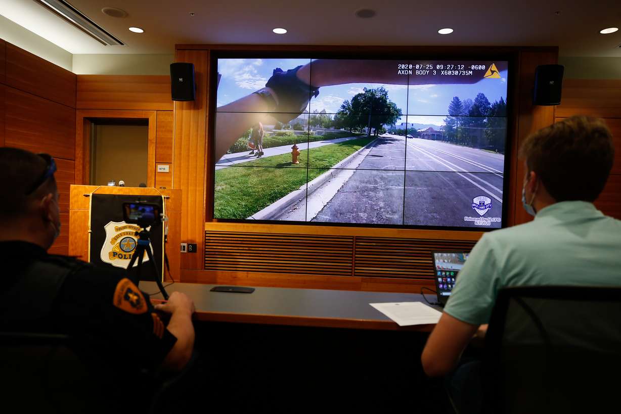 Salt Lake Police Capt. Richard Lewis plays video footage taken by a police officer’s body camera of a July 25 officer-involved shooting during a press conference at the Public Safety Building in Salt Lake City on Friday, Aug. 7, 2020.
