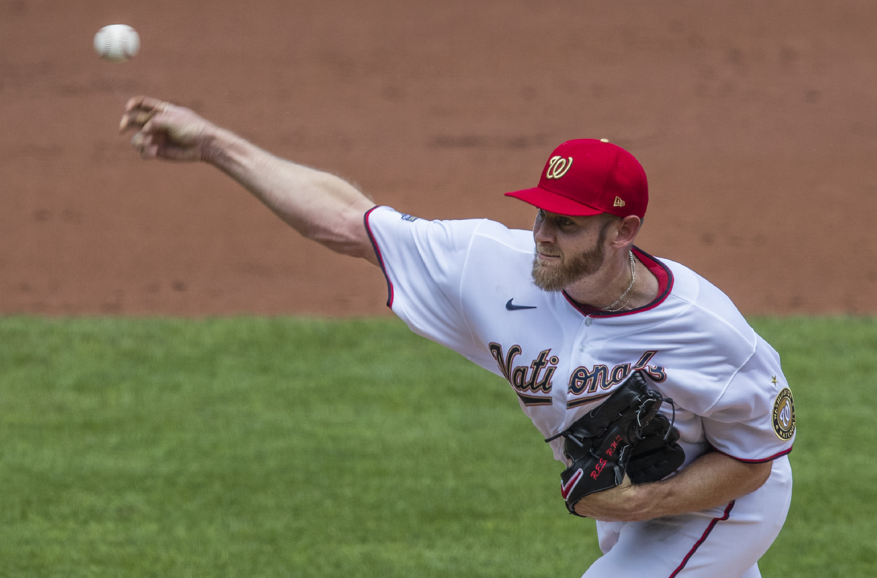 Strasburg's debut shaky; O's-Nats suspended by tarp issues