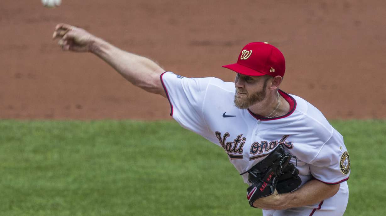 Strasburg's debut shaky; O's-Nats suspended by tarp issues