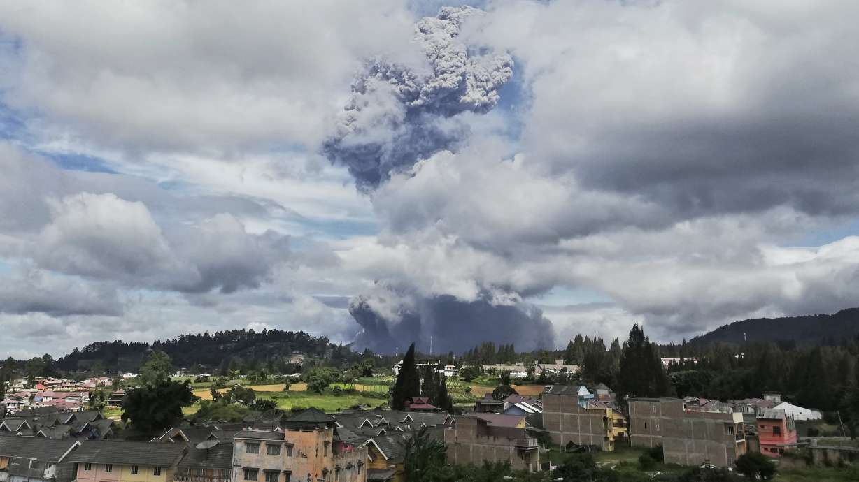 Indonesia's Sinabung volcano ejects towering column of ash
