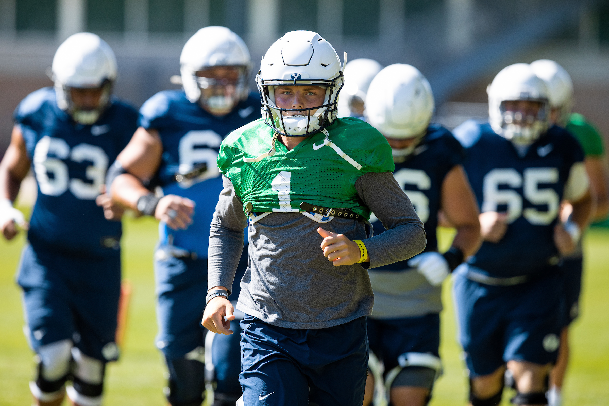 BYU quarterback Zach Wilson leads the team into practice, Monday, Aug. 10, 2020 in Provo. (Photo: Jaren Wilkey, BYU Photo)
