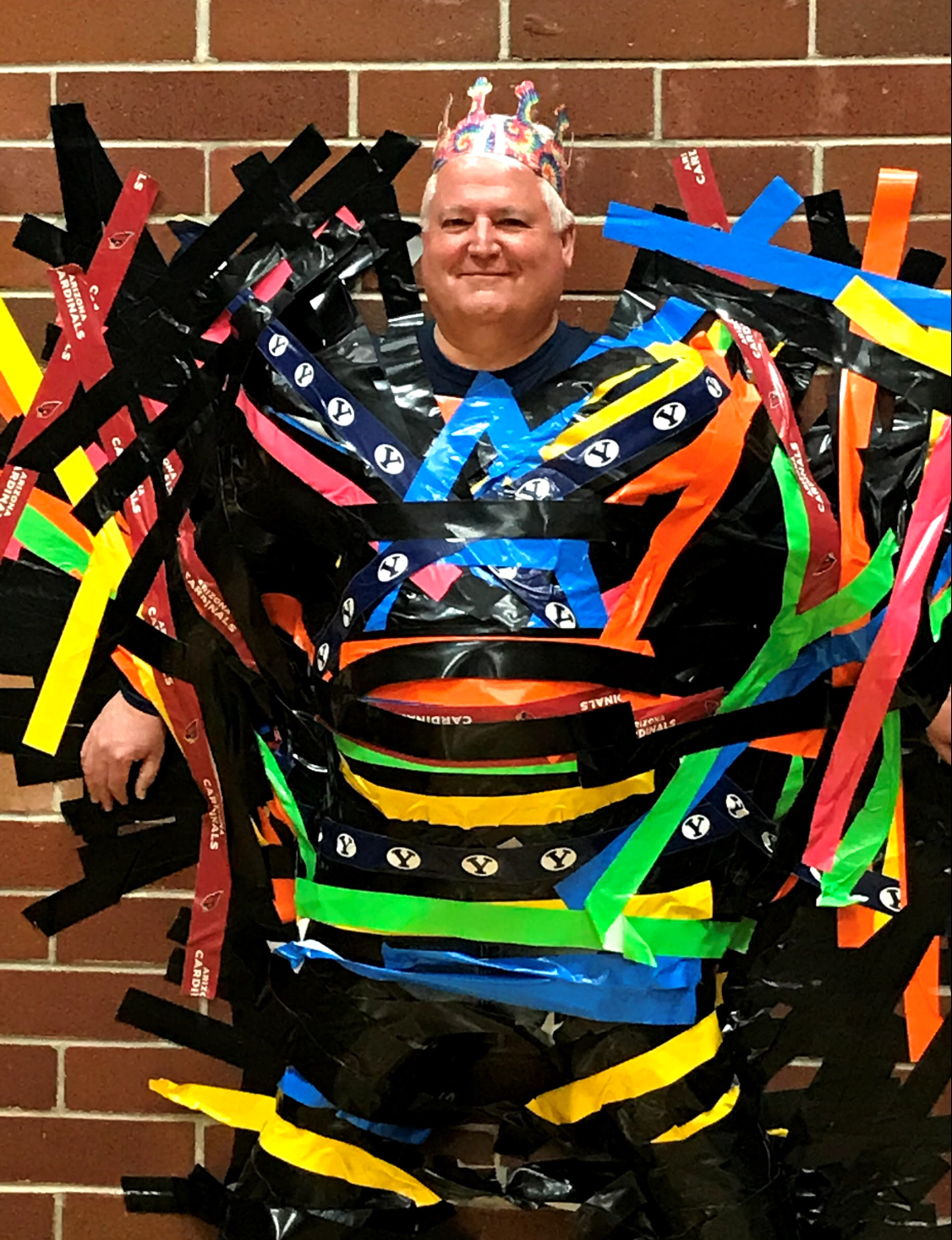 Longtime teacher and principal Kelly Rindlisbacher lost his battle with COVID-19 just days before the school year was set to begin.