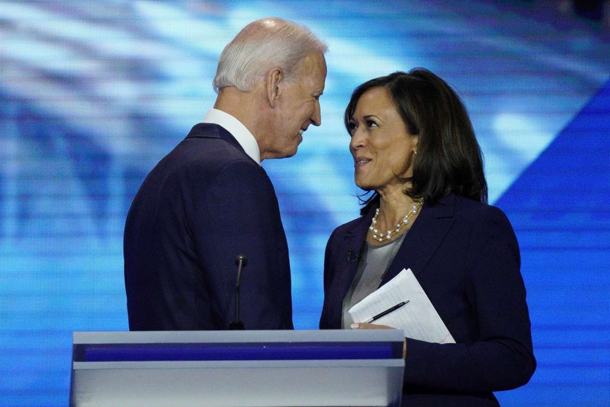 FILE - In this Sept. 12, 2019, file photo, Democratic presidential candidate former Vice President Joe Biden, left, and then-candidate Sen. Kamala Harris, D-Calif. shake hands after a Democratic presidential primary debate hosted by ABC at Texas Southern University in Houston.