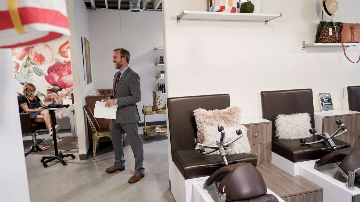 Rep. Ben McAdams, D-Utah, talks to employees at Nailed! in Millcreek after a press conference at the salon about Paycheck Protection Program loans on Thursday, May 14, 2020.