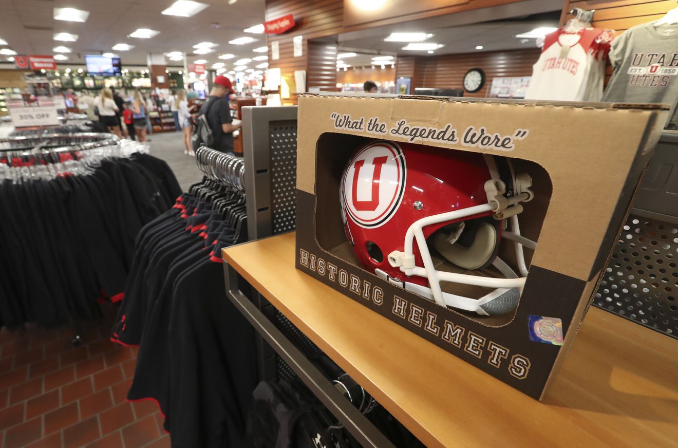 University of Utah football merchandise is on display at the Red Zone inside the University of Utah campus tore in Salt Lake City on Tuesday, Aug. 11, 2020. The Pac-12 Conference, of which Utah is a member, canceled football and all sports competitions through the end of the calendar year.