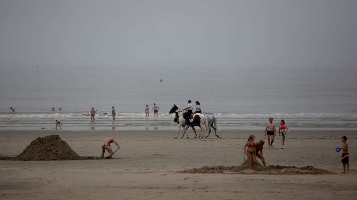 Belgian beach brawl fuels virus, political, climate tension