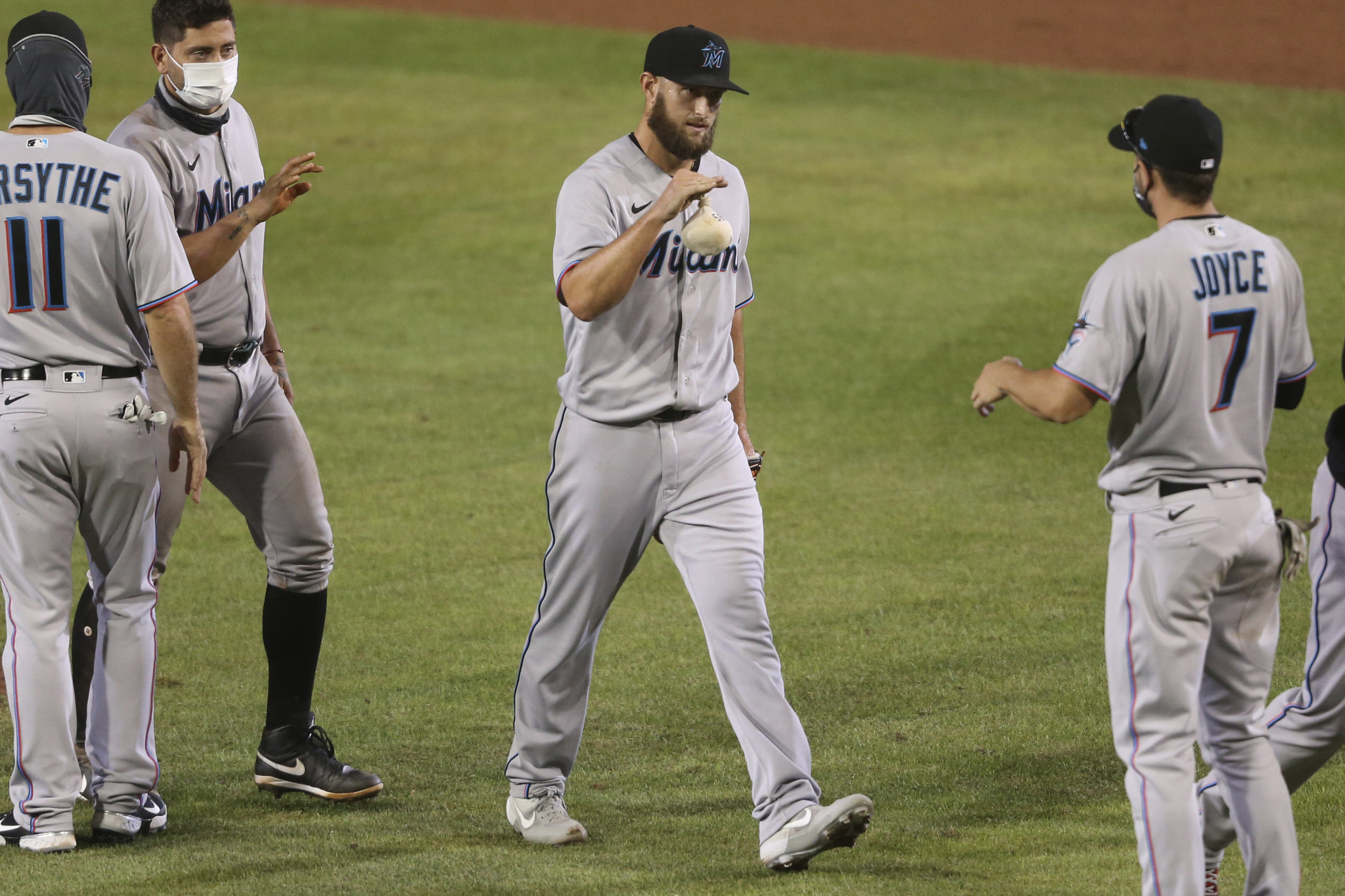 Marlins finally get to go home after beating Blue Jays 14-11