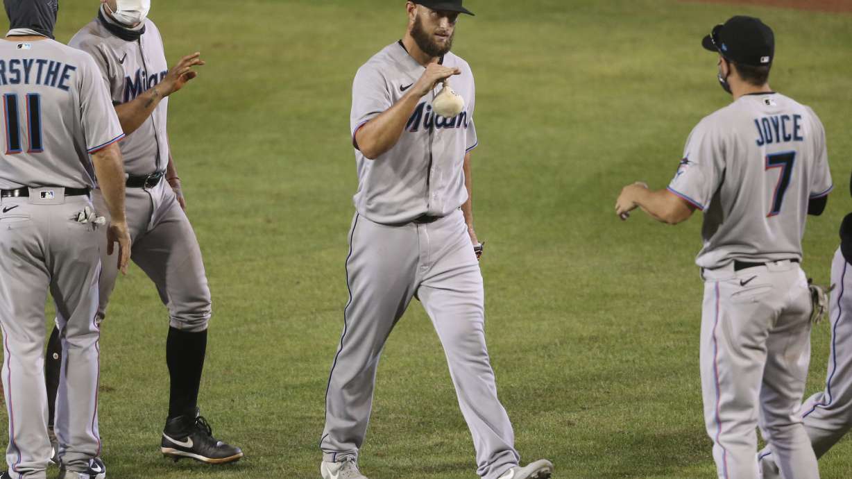 Marlins finally get to go home after beating Blue Jays 14-11