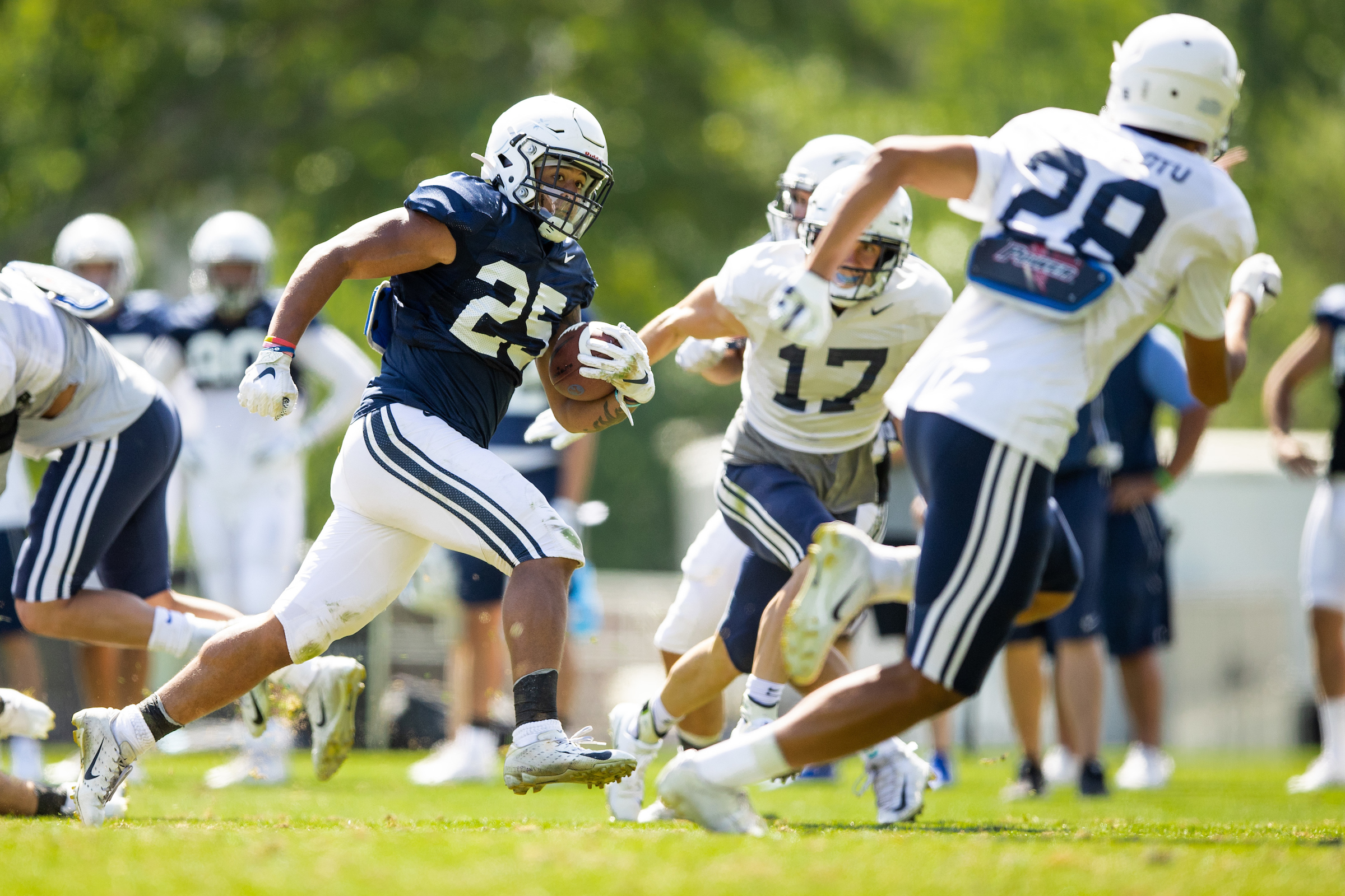 BYU running back Tyler Allgeier runs the ball during fall training camp, Friday, Aug. 14, 2020 in Provo. 