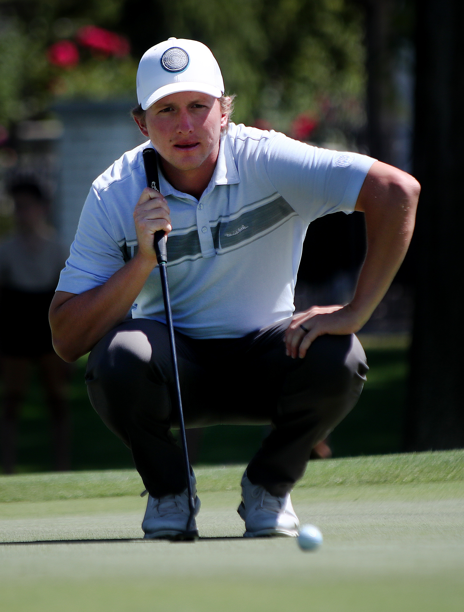 Kelton Hirsch lines up a putt as he and other golfers compete in day two of the Utah Open at Riverside Country Club in Provo on Saturday, Aug. 15, 2020.
