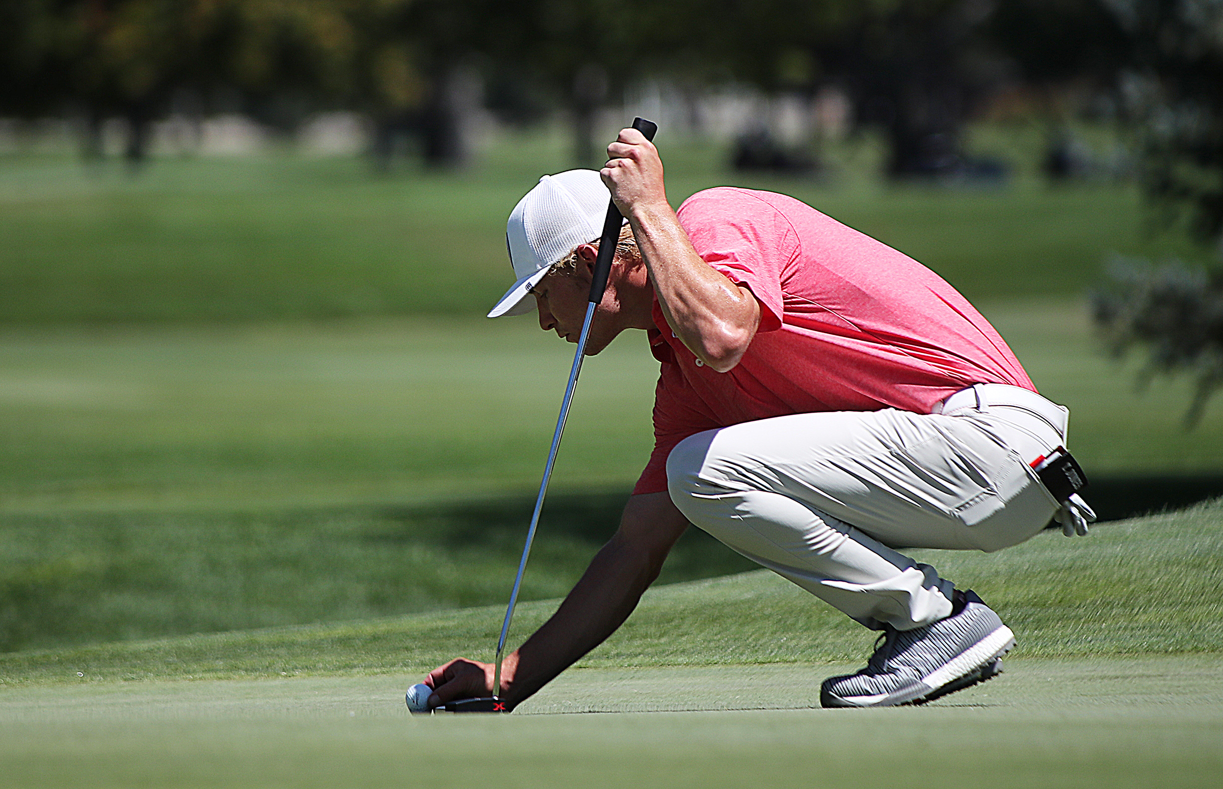 SUU golfer Tyler Jones sets his ball on the green as he and other golfers compete in day two of the Utah Open at Riverside Country Club in Provo on Saturday, Aug. 15, 2020.