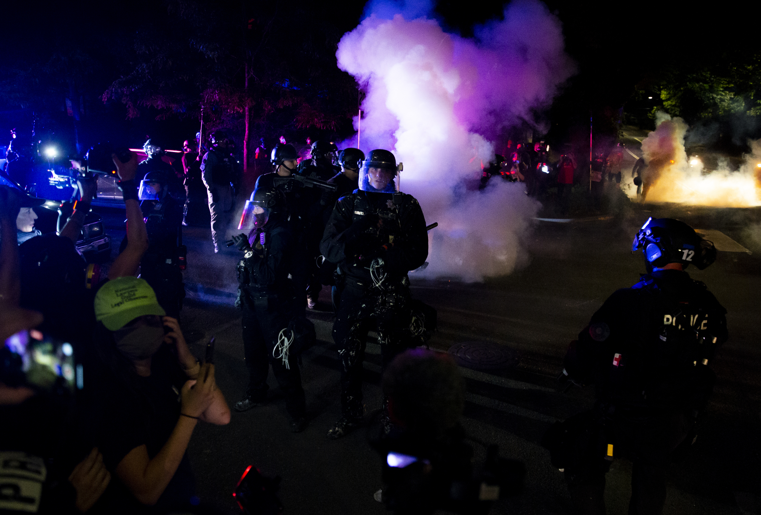 Portland police declare riot, use smoke to clear crowd