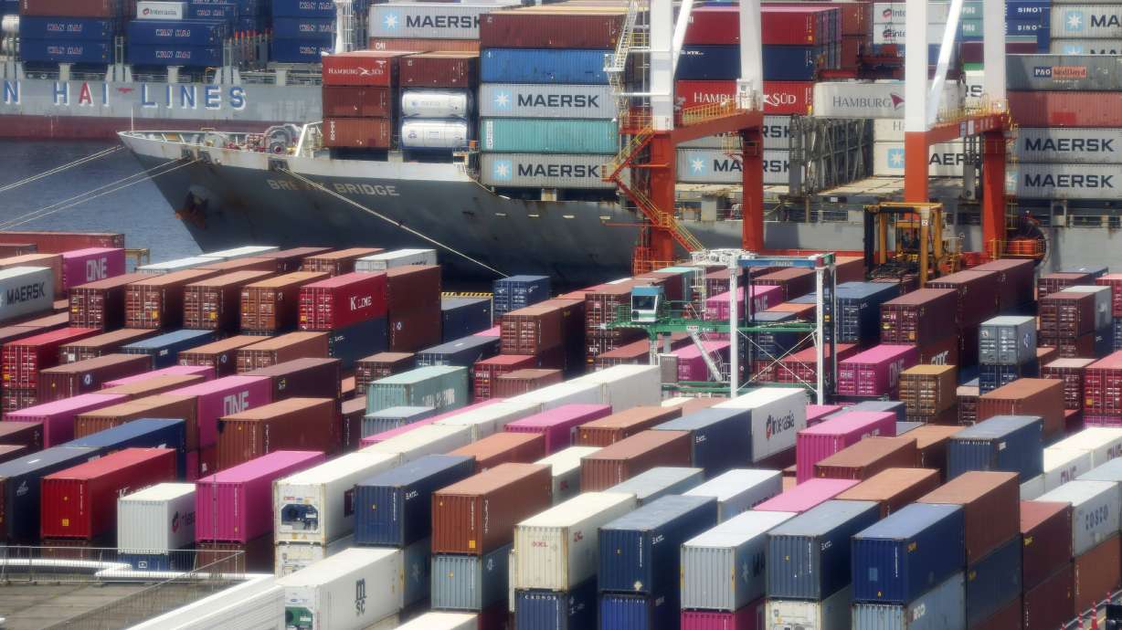 Japan's economy shrinks at record rate, slammed by pandemic