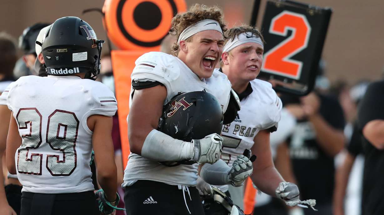 Lone Peak and Timpview play in a high school football game in Provo on Friday, Aug. 14, 2020.