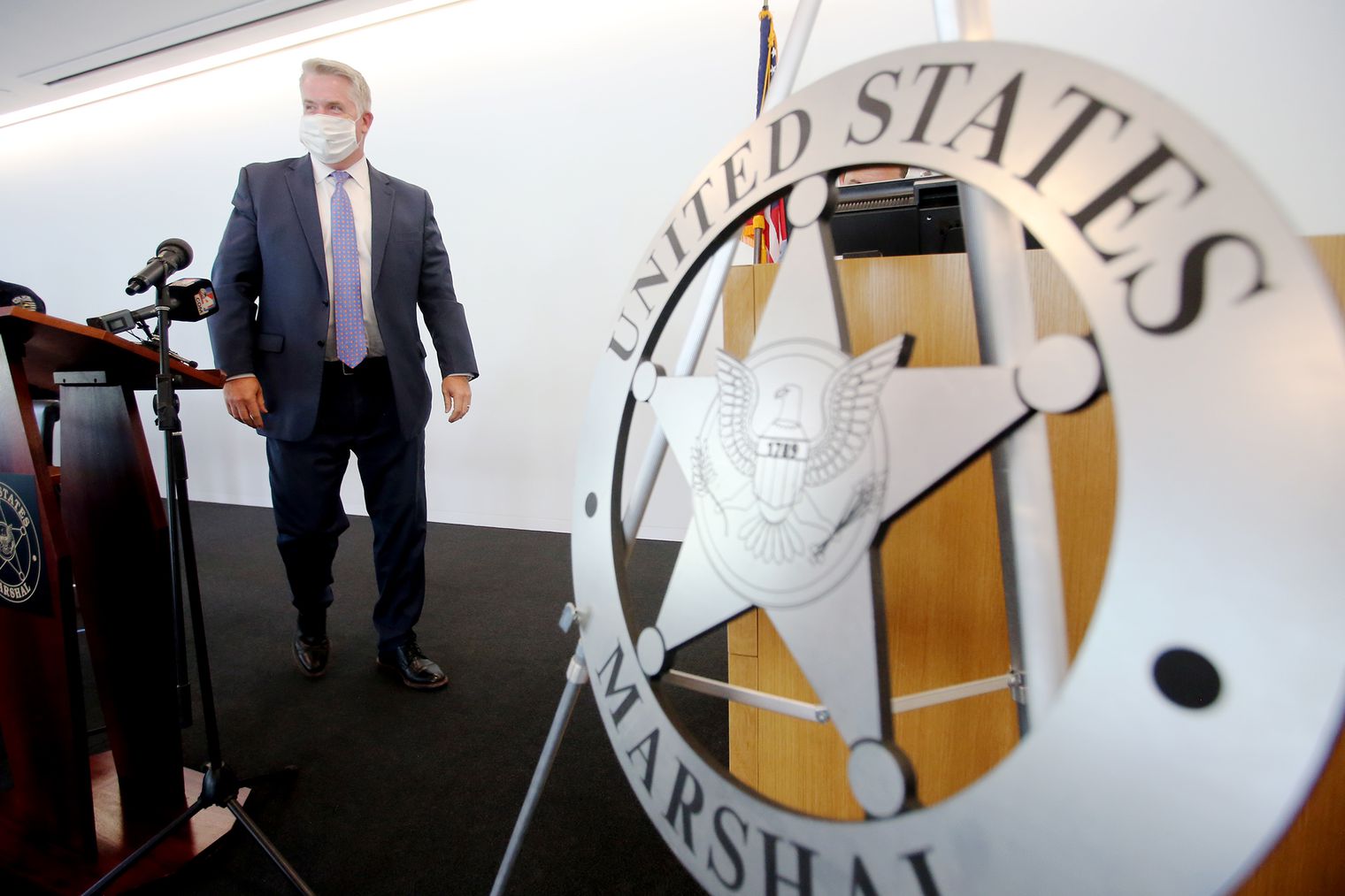 U.S. Attorney John W. Huber walks from behind a table at the federal courthouse in Salt Lake City on Tuesday, Aug. 18, 2020, to do a one-on-one interview about “Operation Reboot,” a two-week operation to make sure Utah’s sex offenders were in compliance.