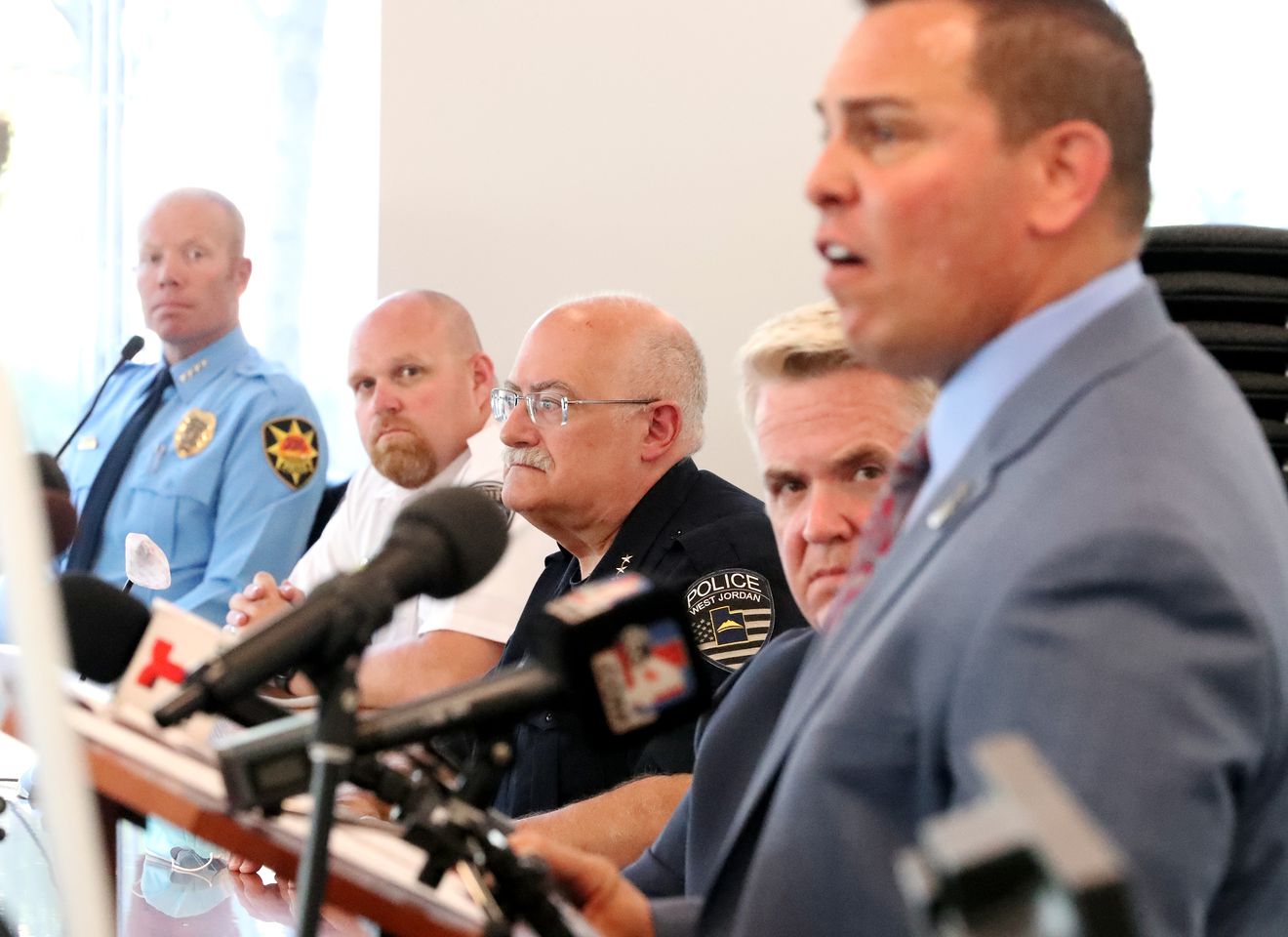 Law enforcement officials from around the state listen as Matthew Harris, head of the U.S. Marshal Service in Utah, right, discusses “Operation Reboot,” a two-week operation to make sure Utah’s sex offenders were in compliance, during a press conference at the federal courthouse in Salt Lake City on Tuesday, Aug. 18, 2020.