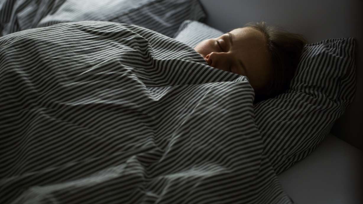 A new study shows sleeping with a dim light raised the blood sugar and heart rate of healthy young people.