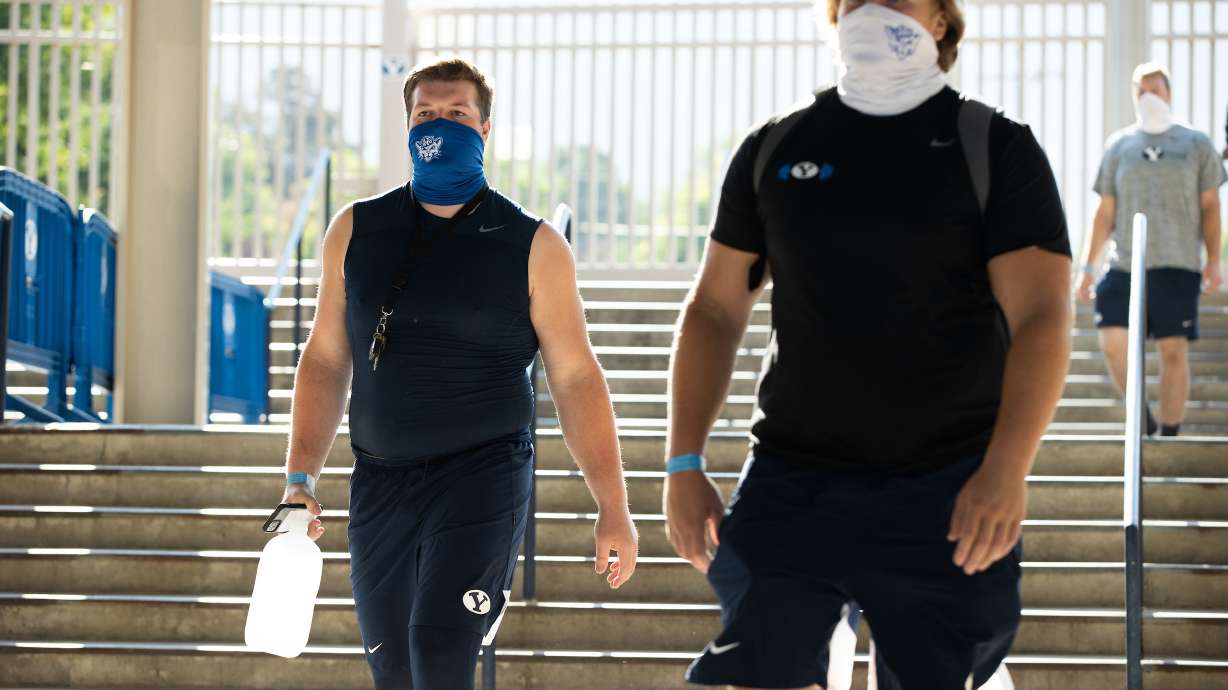 BYU football players arrive for a scrimmage at LaVell Edwards Stadium wearing masks, Thursday, Aug. 20, 2020 in Provo.
2020 BYU Football Fall Camp - Team Scrimmage in Lavell Edwards Stadium
June 19, 2020
Photo by Jaren Wilkey/BYU
© BYU PHOTO 2020
All Rights Reserved
photo@byu.edu (801)422-7322